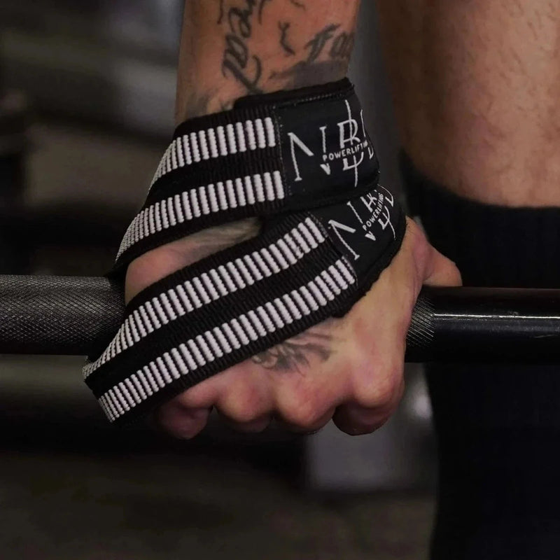 NBD Powerlifter using NBD white rubber lifting straps deadlift training gym India