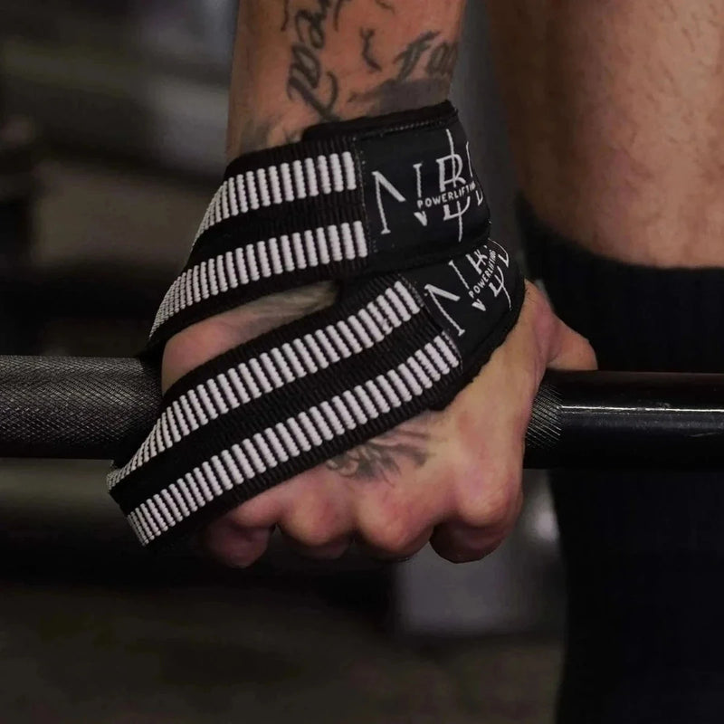 NBD Powerlifter using NBD white rubber lifting straps deadlift training gym India