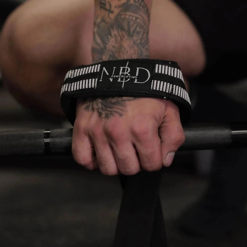 NBD Powerlifter using NBD white rubber lifting straps deadlift training gym India