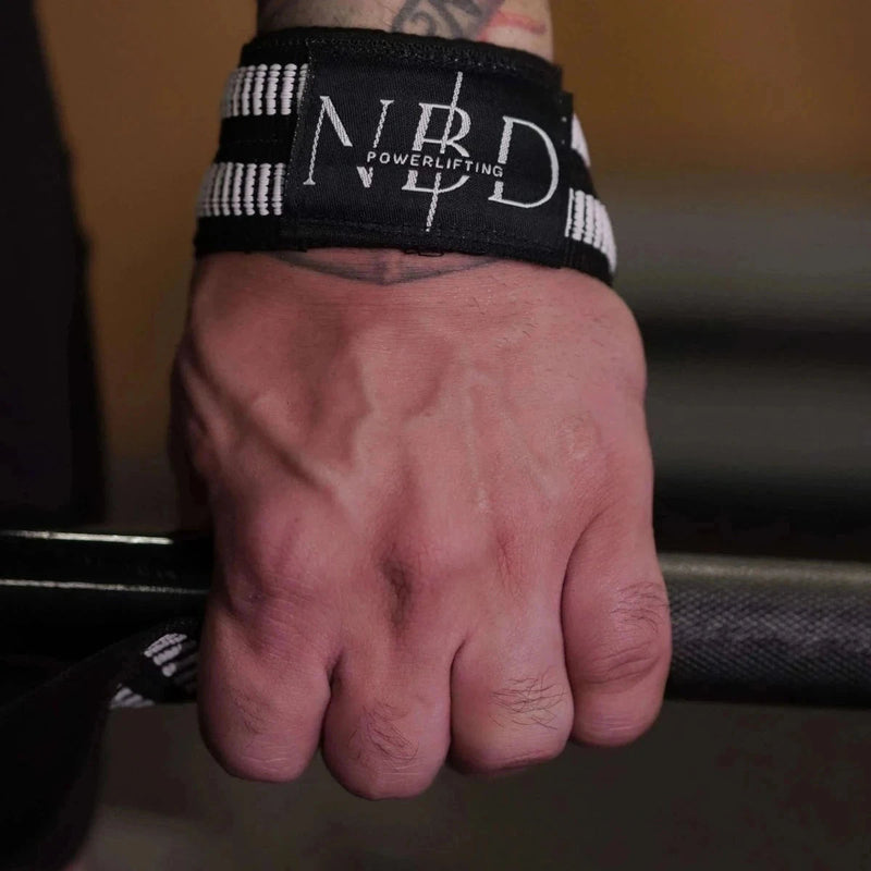 NBD Powerlifter using NBD white rubber lifting straps deadlift training gym India