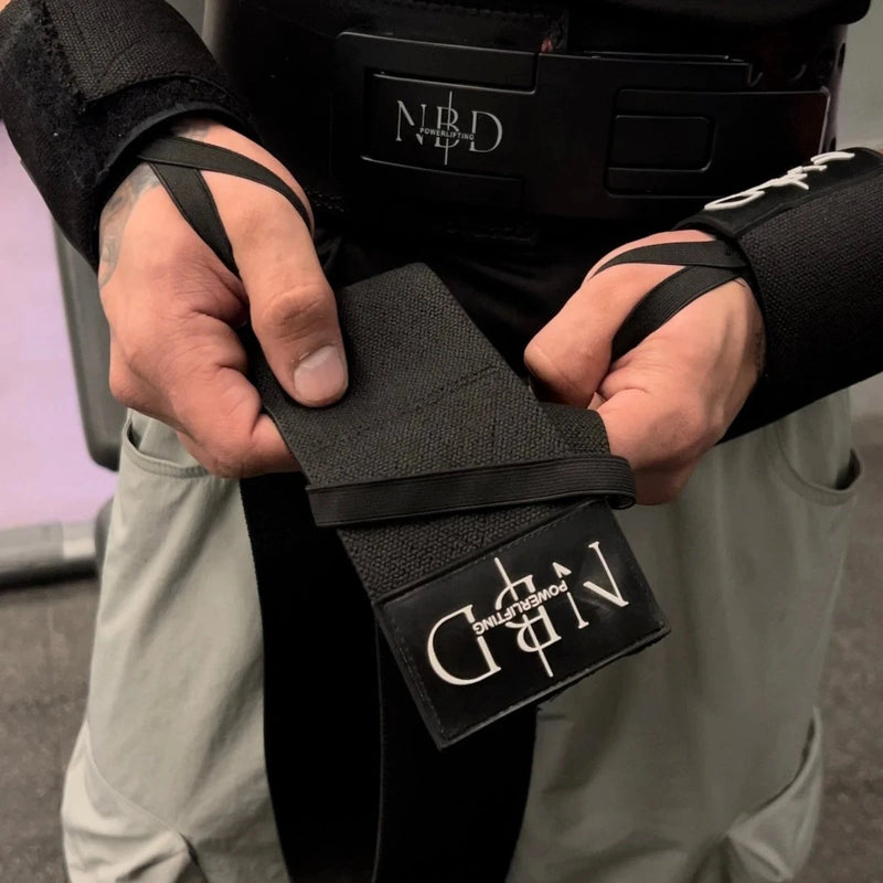 NBD Close-up of NBD Black Series elbow wraps showing heavy duty material and professional construction