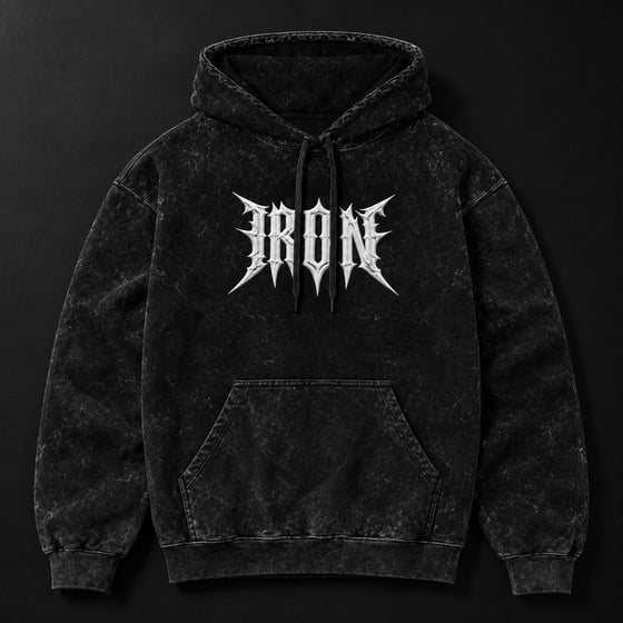 NBD IRON acid wash hoodie in Black — front view, white IRON lettering across the chest, drawcord hood and kangaroo pocket