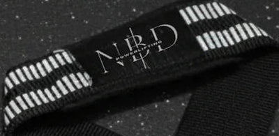 Macro of the white rubber ribs and stitched edge on an NBD lifting strap