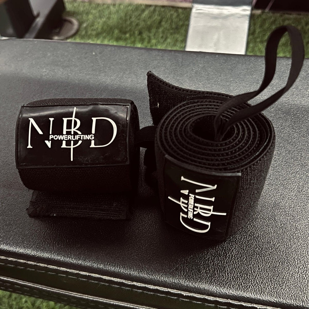 Pair of NBD 1M powerlifting wrist wraps with thumb loops