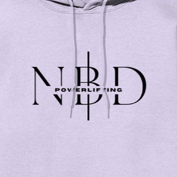 NBD SIGNATURE logo hoodie in Lavender — chest close-up of the NBD Powerlifting monogram print