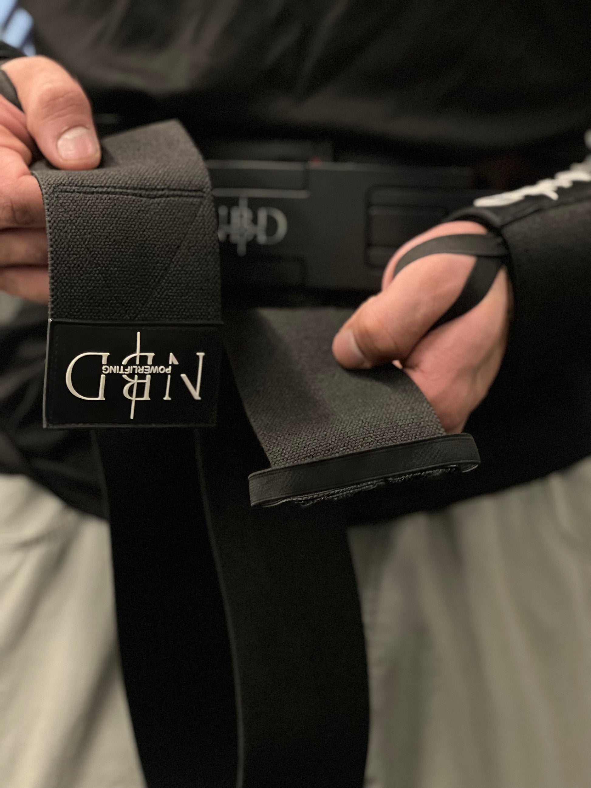 NBD Elbow Wraps providing enhanced joint support for lifting performance.

