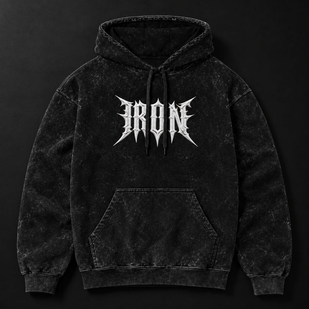 NBD IRON acid wash hoodie in Black — front view, white IRON lettering across the chest, drawcord hood and kangaroo pocket