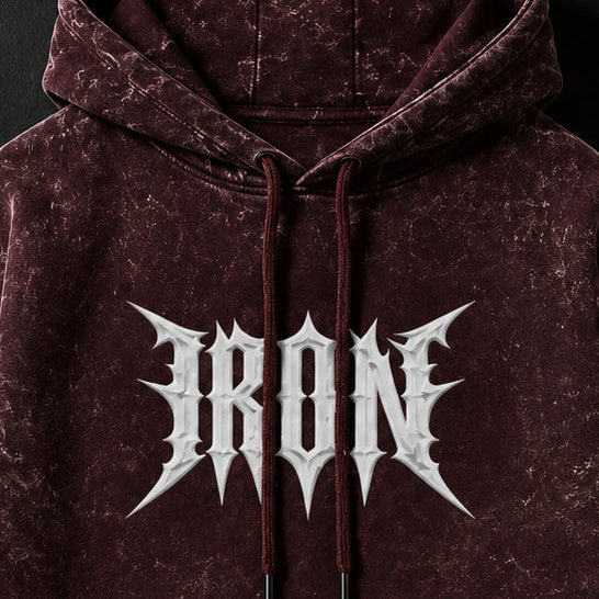 NBD IRON acid wash hoodie in Maroon — front print close-up, white IRON lettering across the chest