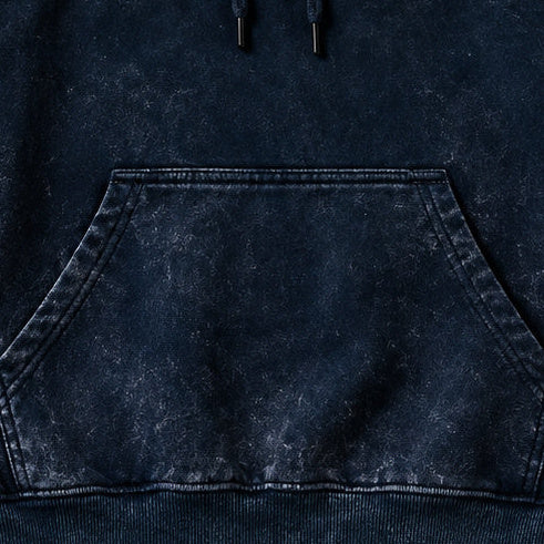 NBD IRON acid wash hoodie in Navy Blue — front close-up, kangaroo pocket and drawcords
