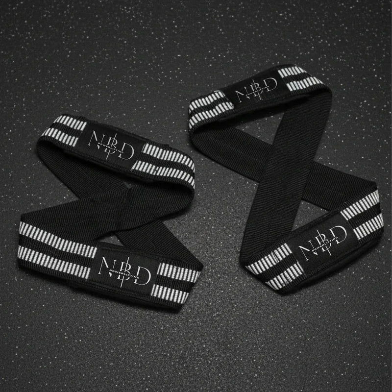 NBD Powerlifter using NBD white rubber lifting straps deadlift training gym India