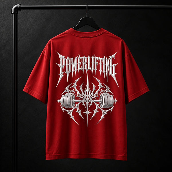 NBD POWERLIFTING Crest oversized T-shirt in Red — back view, raised white 3D puff print POWERLIFTING lettering above a barbell crest, studio shot on a hanger
