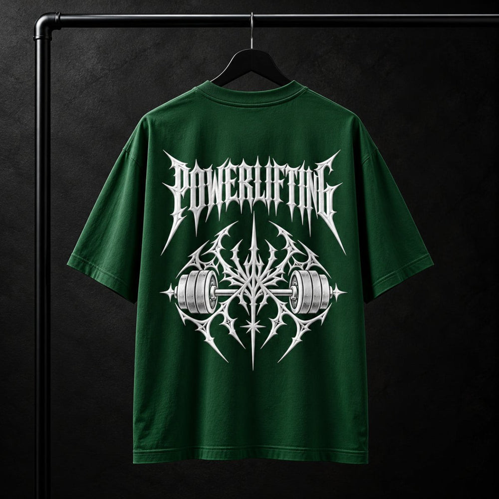 NBD POWERLIFTING Crest oversized T-shirt in Bottle Green — back view, raised white 3D puff print POWERLIFTING lettering above a barbell crest, studio shot on a hanger