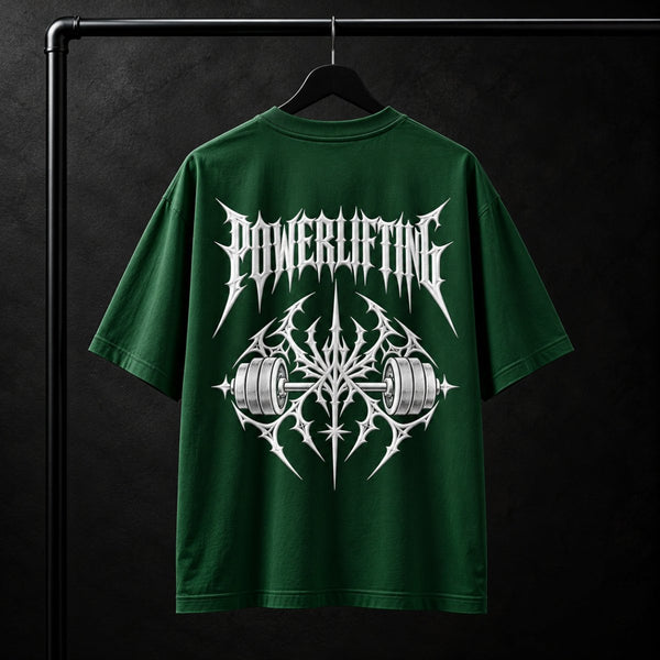 NBD POWERLIFTING Crest oversized T-shirt in Bottle Green — back view, raised white 3D puff print POWERLIFTING lettering above a barbell crest, studio shot on a hanger
