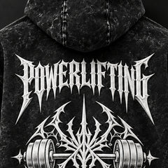 Close-up of the white 3D puff print POWERLIFTING lettering on the back of the Crest hoodie