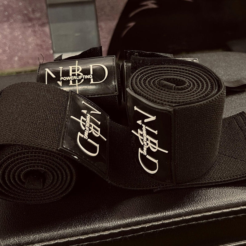 NBD Powerlifter using NBD 1 meter wrist wraps during weightlifting workout India