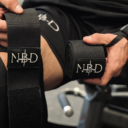 NBD Powerlifting Wrist Wraps delivering superior wrist support during intense workouts.

