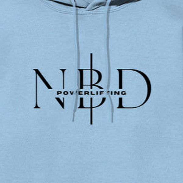 NBD SIGNATURE logo hoodie in Baby Blue — chest close-up of the NBD Powerlifting monogram print