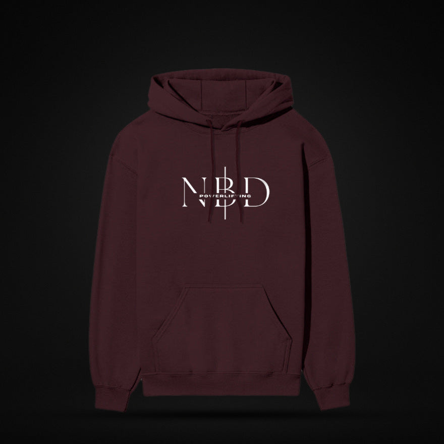 NBD SIGNATURE 300 GSM logo hoodie in Maroon — front view, NBD Powerlifting monogram on the chest, kangaroo pocket, studio shot