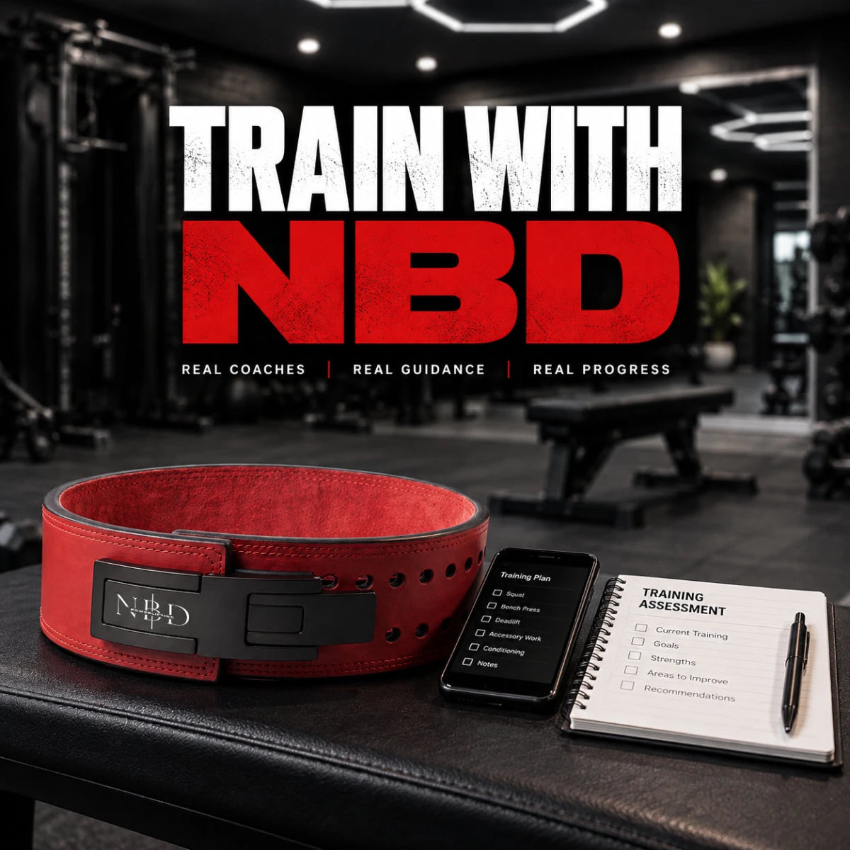 NBD training assessment: a red NBD lever belt on a gym bench beside a phone showing a training plan and a written training assessment checklist.